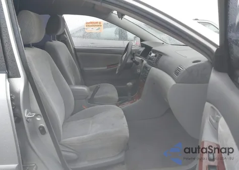 2003 Toyota Corolla Le z USA, uszkodzony, nr VIN JTDBR32E730041318